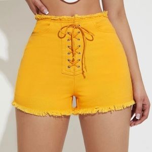 Lace up front raw cut denim shorts size Large